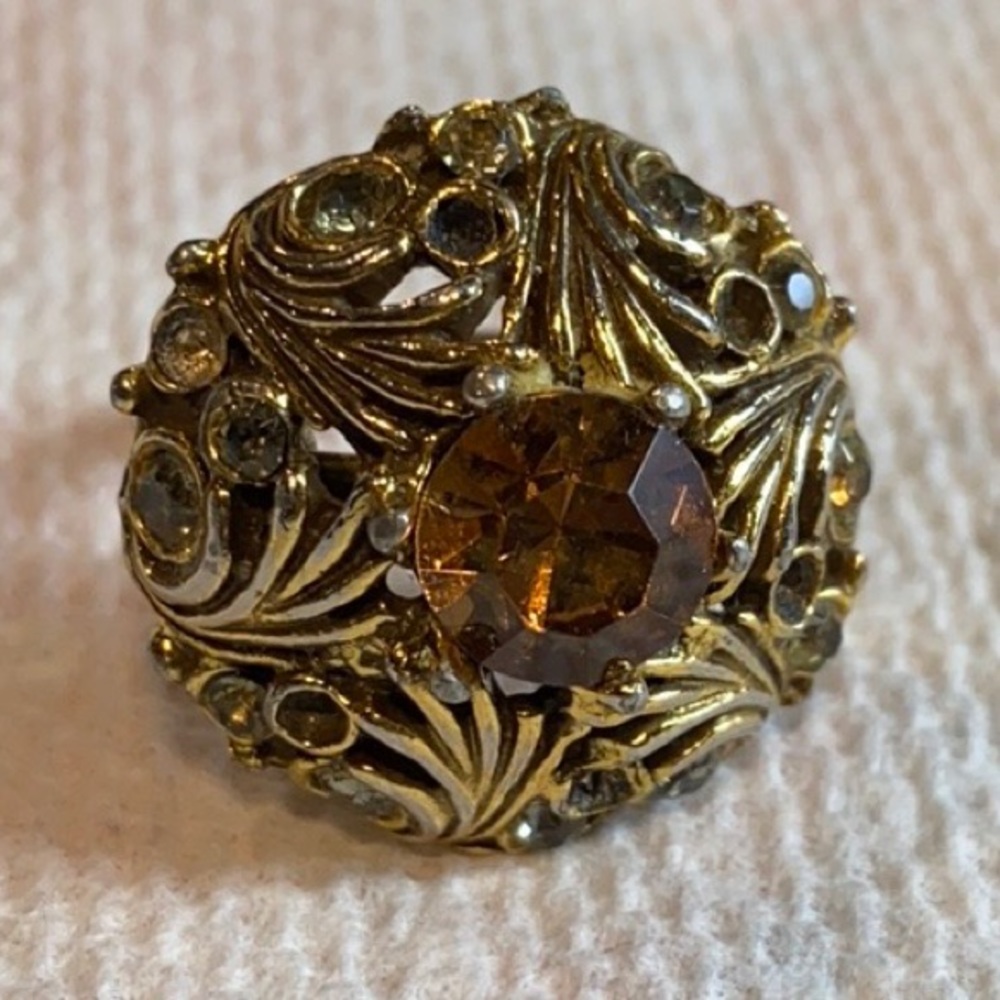 Vintage sizeable ring with amber colored stone